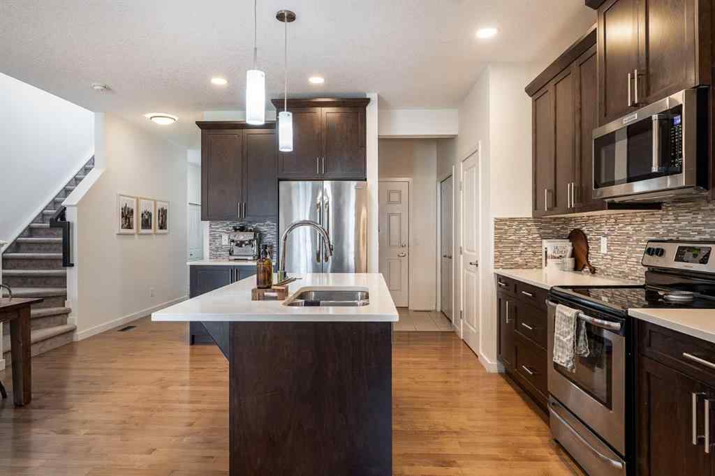 MLS® A2239365 - 112 Midtown Court SW in Midtown Airdrie, Residential