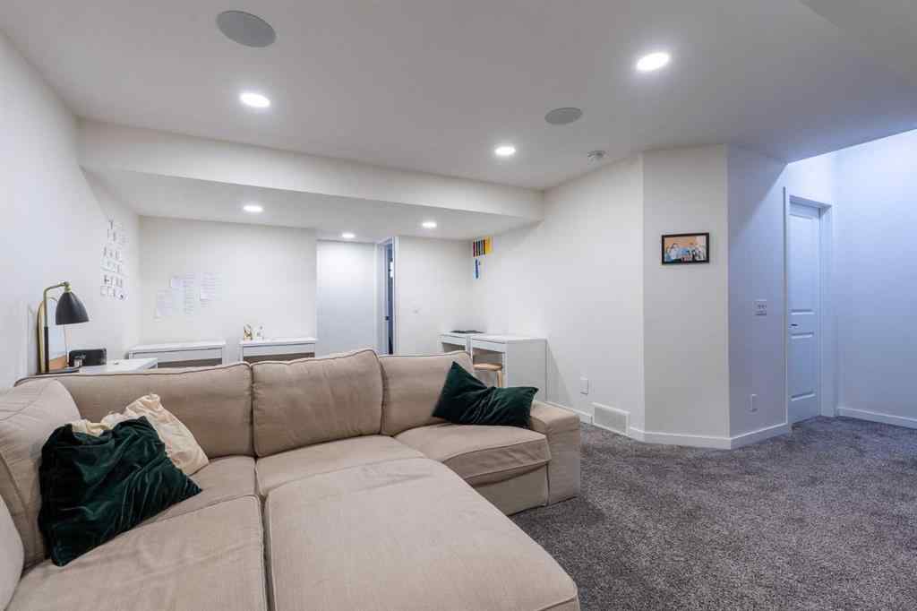 MLS® A2239365 - 112 Midtown Court SW in Midtown Airdrie, Residential