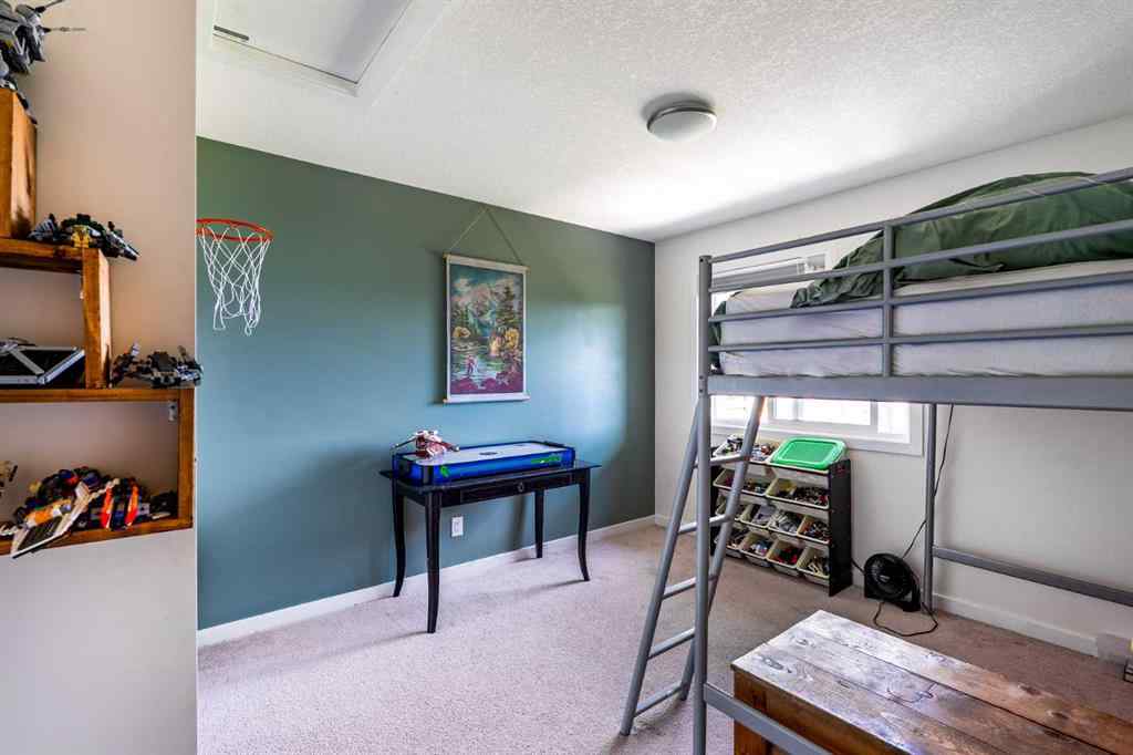 MLS® A2239365 - 112 Midtown Court SW in Midtown Airdrie, Residential