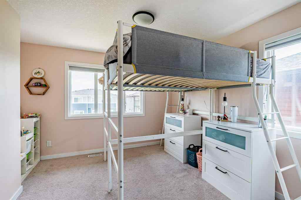 MLS® A2239365 - 112 Midtown Court SW in Midtown Airdrie, Residential
