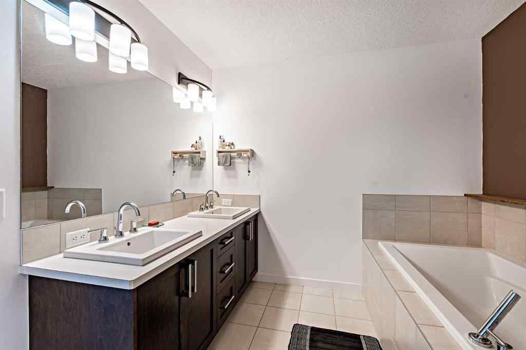 MLS® A2239365 - 112 Midtown Court SW in Midtown Airdrie, Residential