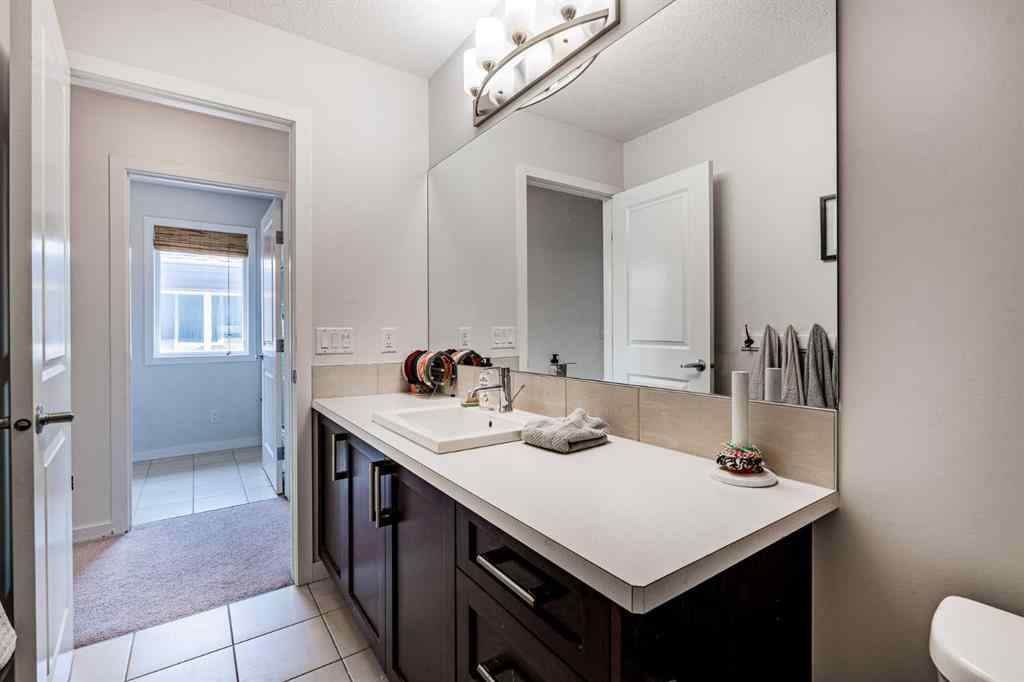 MLS® A2239365 - 112 Midtown Court SW in Midtown Airdrie, Residential