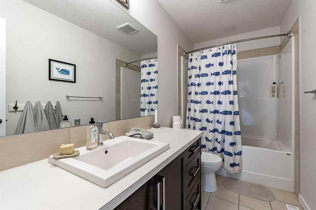 MLS® A2239365 - 112 Midtown Court SW in Midtown Airdrie, Residential