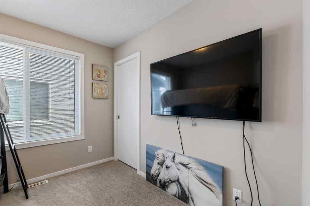MLS® A2239375 - Unit #203 130 Redstone Walk NE in Redstone Calgary, Residential