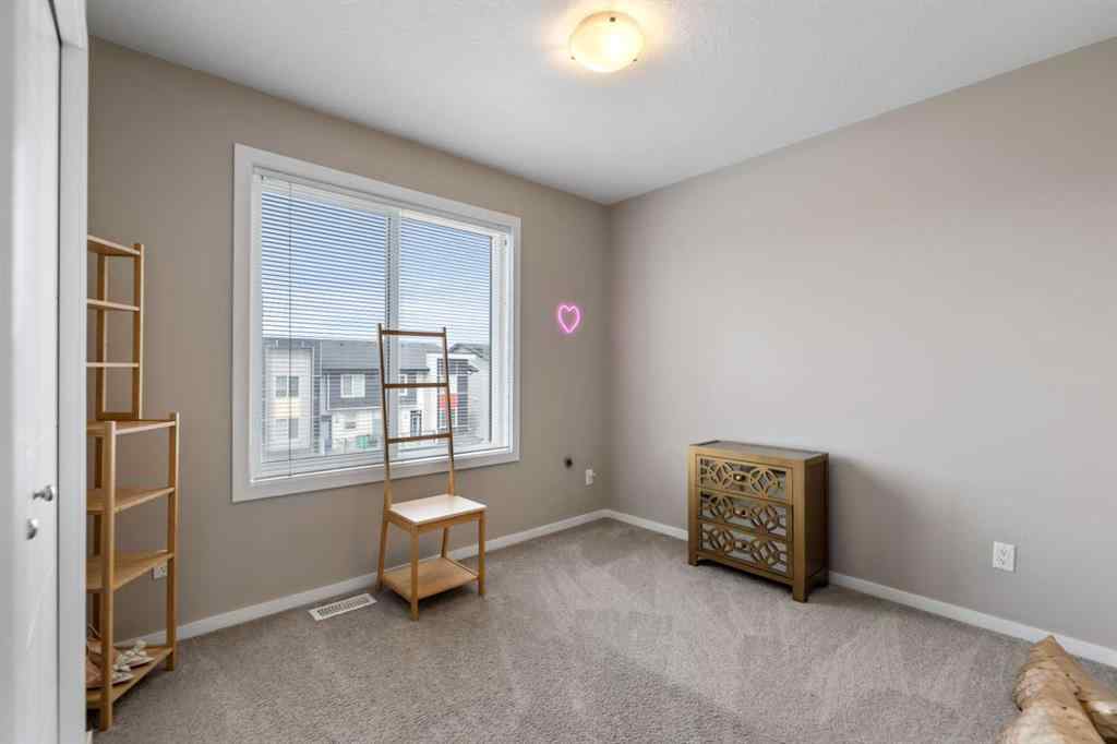 MLS® A2239375 - Unit #203 130 Redstone Walk NE in Redstone Calgary, Residential