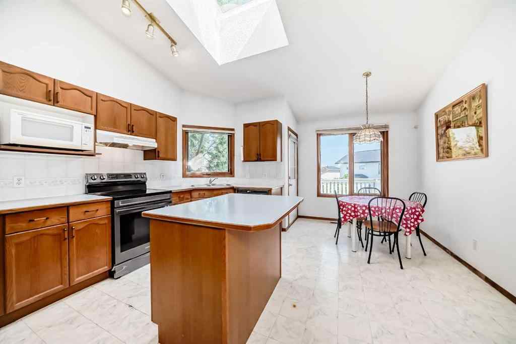 MLS® A2239382 - 28 Harvest Oak Drive NE in Harvest Hills Calgary, Residential