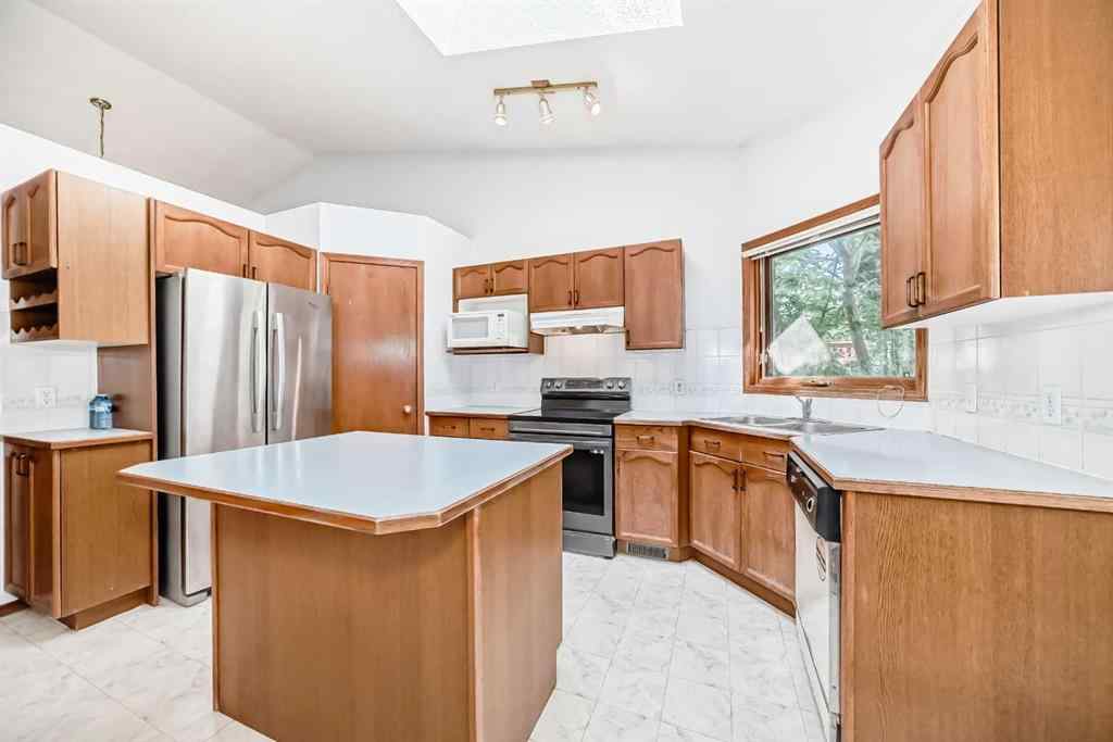 MLS® A2239382 - 28 Harvest Oak Drive NE in Harvest Hills Calgary, Residential