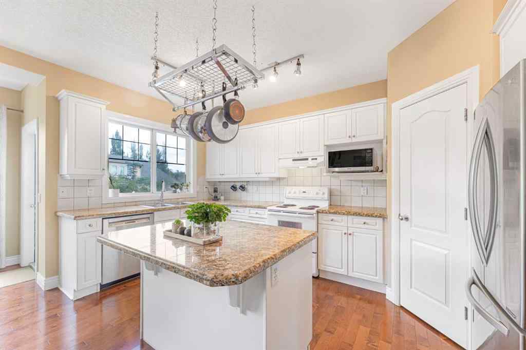 MLS® A2239402 - 10 Tusslewood Heights NW in Tuscany Calgary, Residential