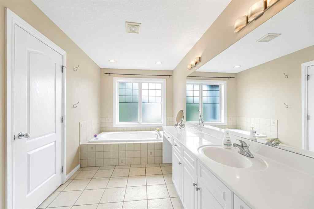 MLS® A2239402 - 10 Tusslewood Heights NW in Tuscany Calgary, Residential