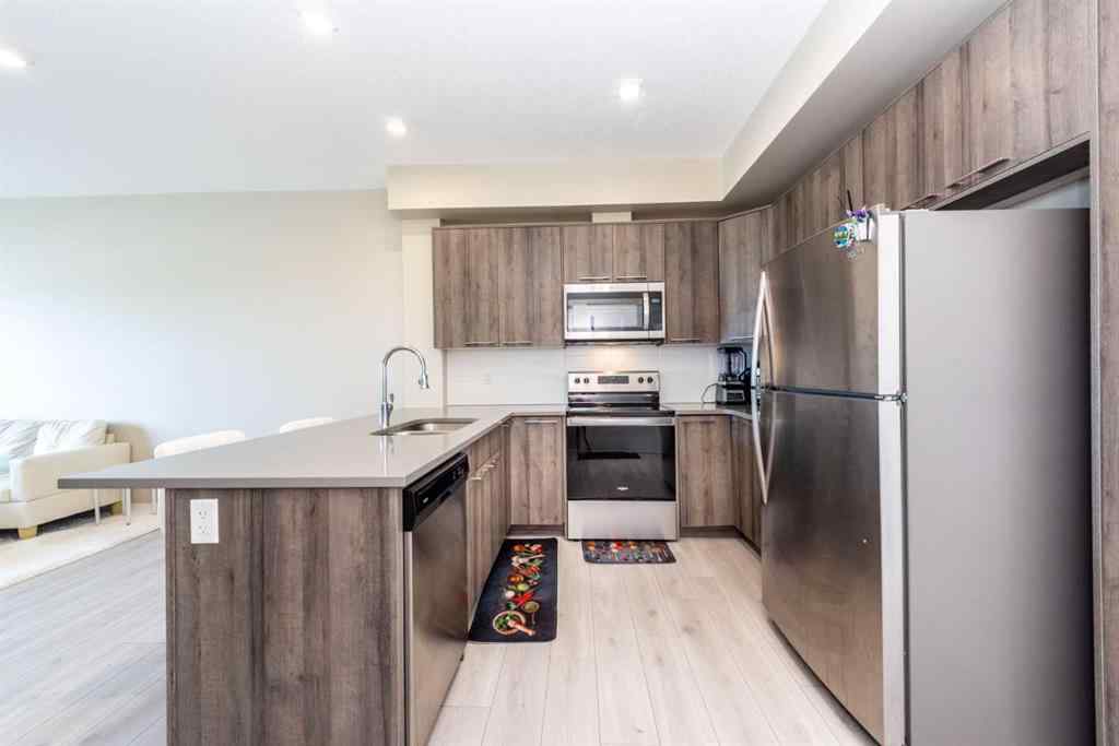 MLS® A2239409 - Unit #211 214 Sherwood Square NW in Sherwood Calgary, Residential