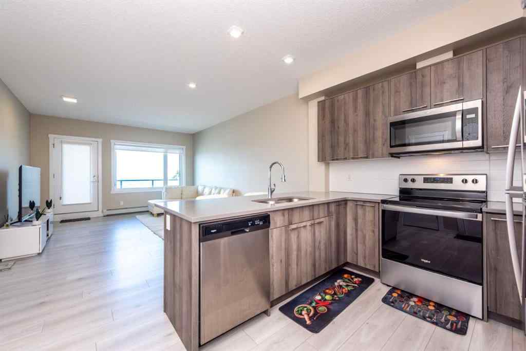 MLS® A2239409 - Unit #211 214 Sherwood Square NW in Sherwood Calgary, Residential