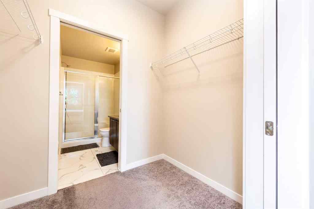 MLS® A2239409 - Unit #211 214 Sherwood Square NW in Sherwood Calgary, Residential