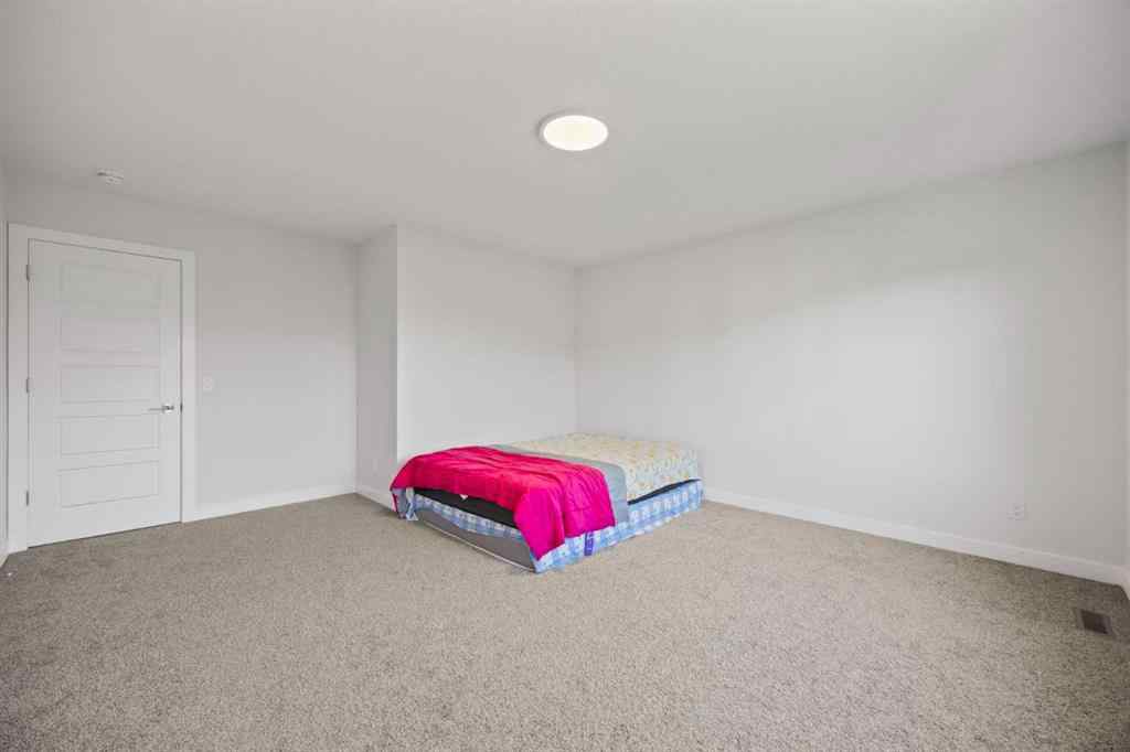 MLS® A2239472 - 105 Creekstone Path SW in Pine Creek Calgary, Residential