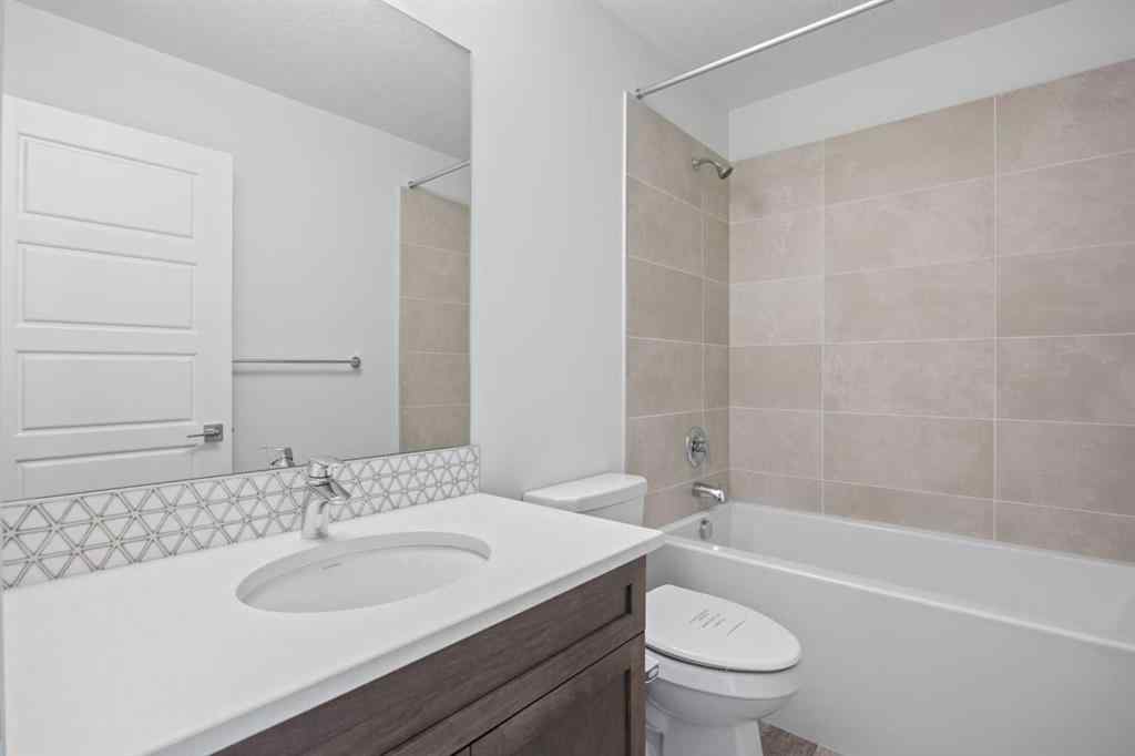 MLS® A2239472 - 105 Creekstone Path SW in Pine Creek Calgary, Residential
