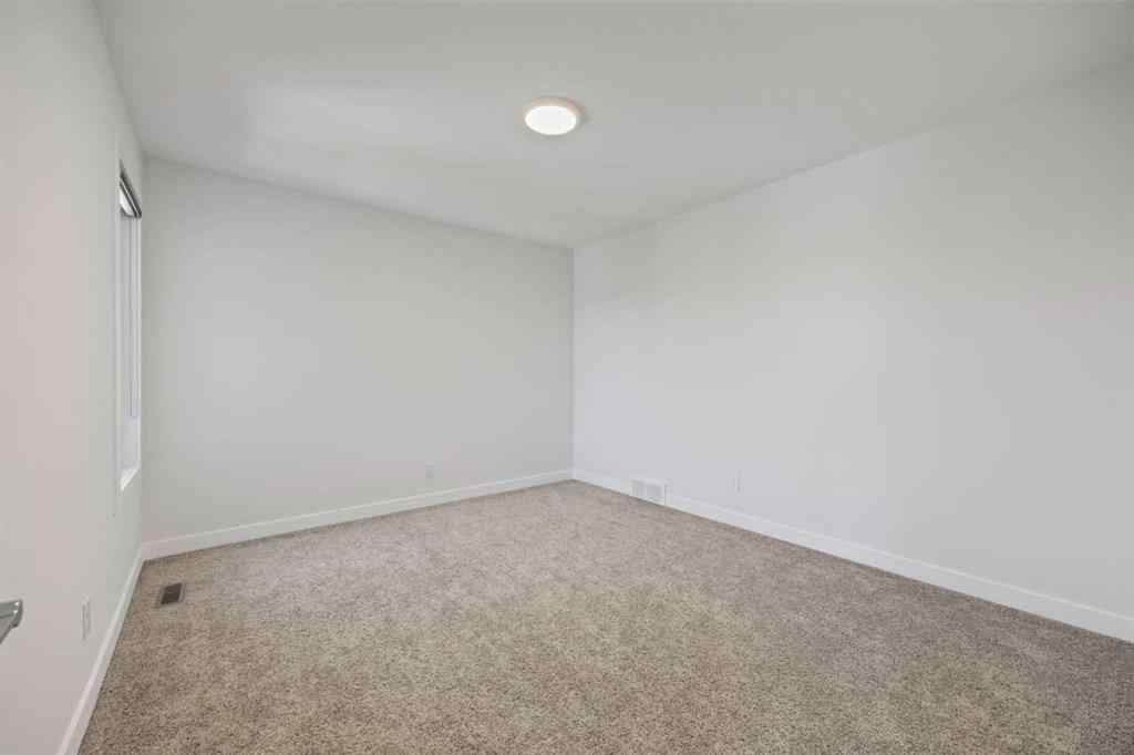 MLS® A2239472 - 105 Creekstone Path SW in Pine Creek Calgary, Residential