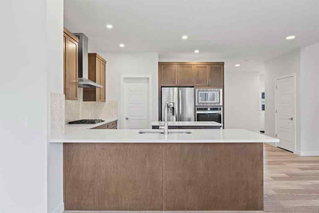 MLS® A2239472 - 105 Creekstone Path SW in Pine Creek Calgary, Residential
