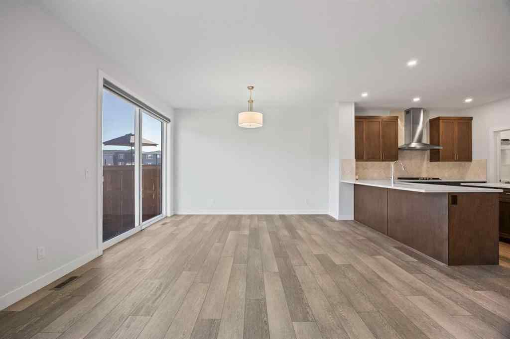 MLS® A2239472 - 105 Creekstone Path SW in Pine Creek Calgary, Residential
