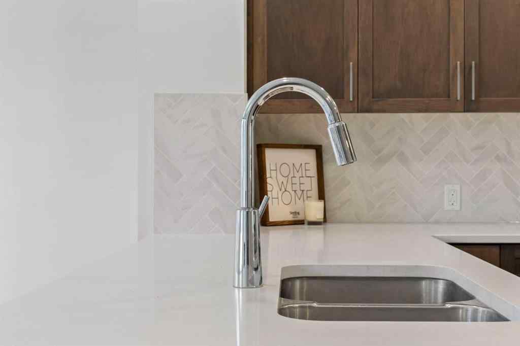 MLS® A2239472 - 105 Creekstone Path SW in Pine Creek Calgary, Residential