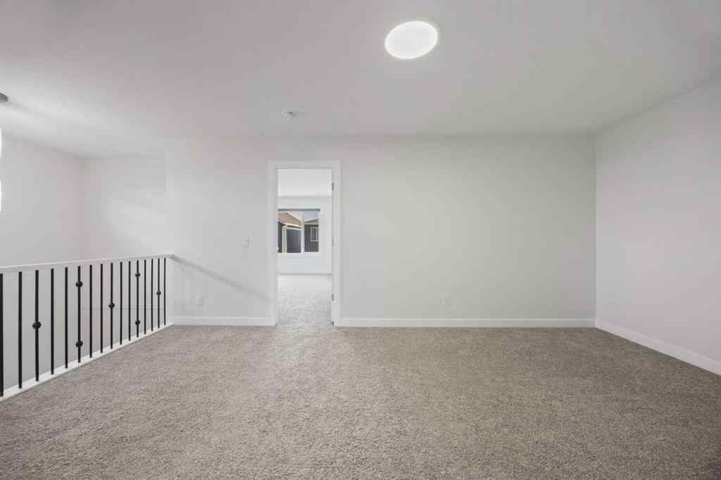MLS® A2239472 - 105 Creekstone Path SW in Pine Creek Calgary, Residential