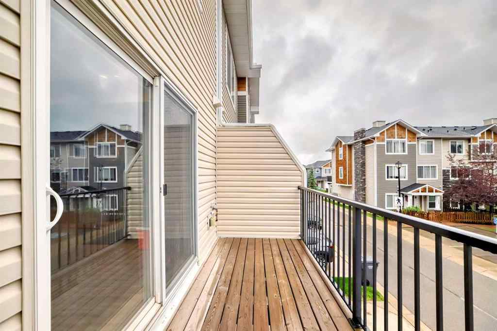 MLS® A2239508 - Unit #127 2802 Kings Heights Gate SE in Ravenswood Airdrie, Residential