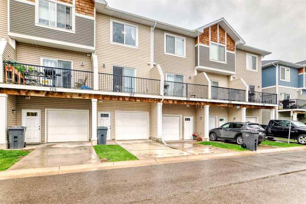 MLS® A2239508 - Unit #127 2802 Kings Heights Gate SE in Ravenswood Airdrie, Residential