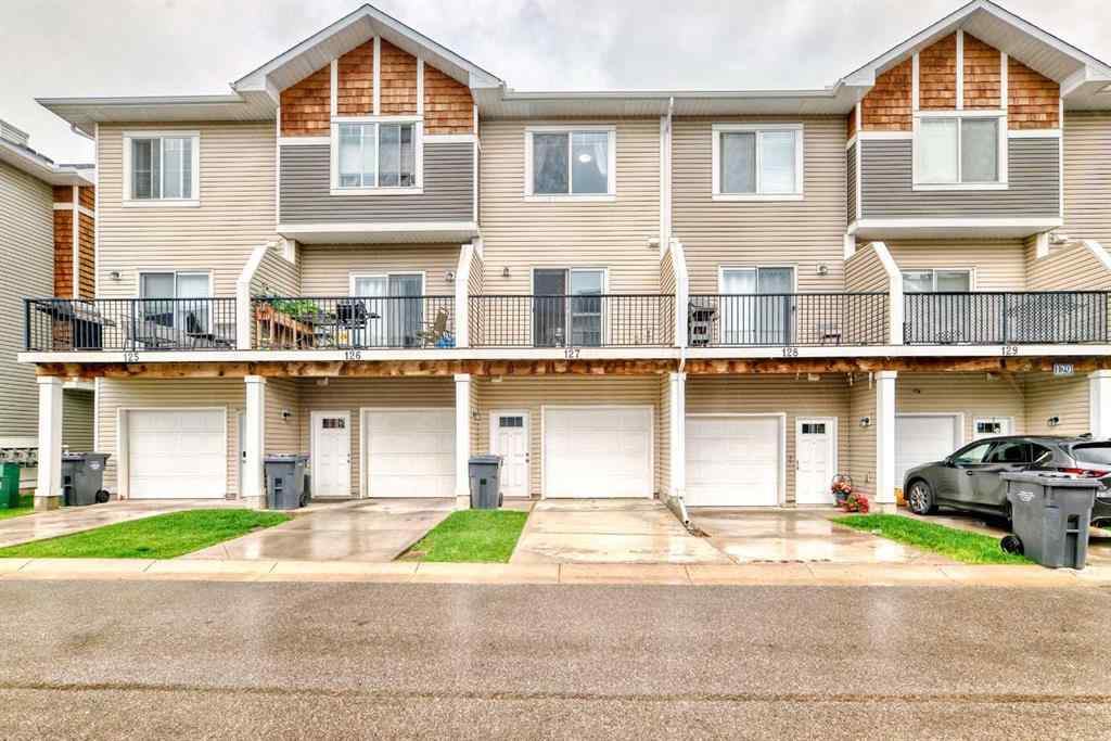 MLS® A2239508 - Unit #127 2802 Kings Heights Gate SE in Ravenswood Airdrie, Residential