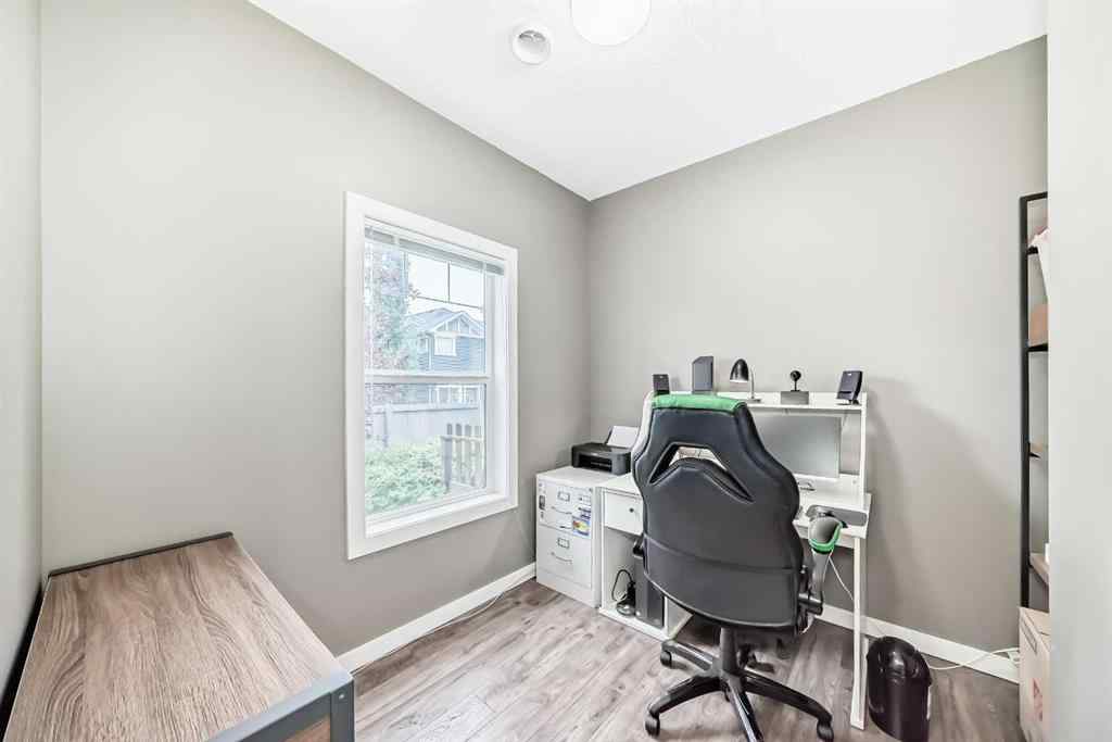MLS® A2239508 - Unit #127 2802 Kings Heights Gate SE in Ravenswood Airdrie, Residential