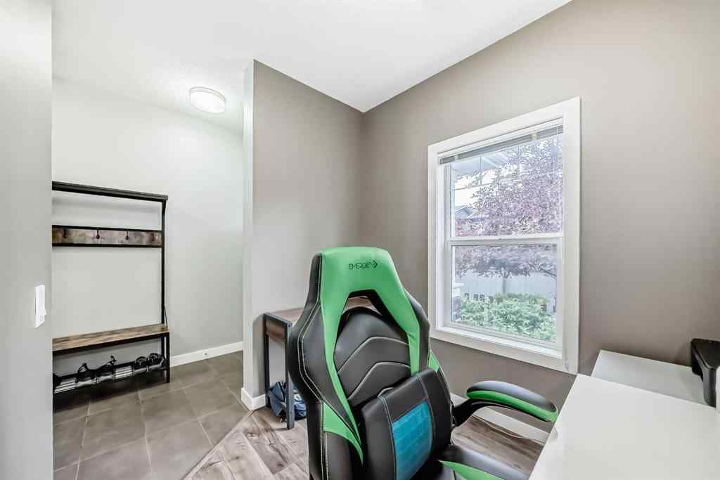 MLS® A2239508 - Unit #127 2802 Kings Heights Gate SE in Ravenswood Airdrie, Residential