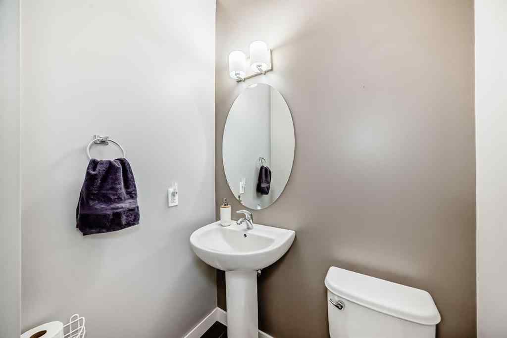 MLS® A2239508 - Unit #127 2802 Kings Heights Gate SE in Ravenswood Airdrie, Residential