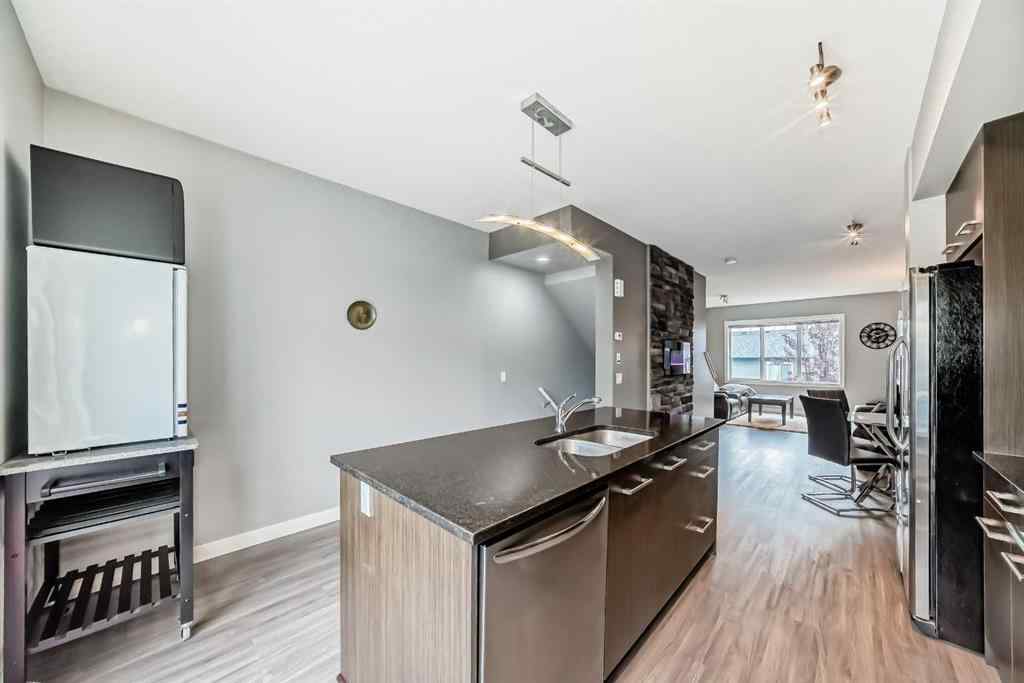 MLS® A2239508 - Unit #127 2802 Kings Heights Gate SE in Ravenswood Airdrie, Residential