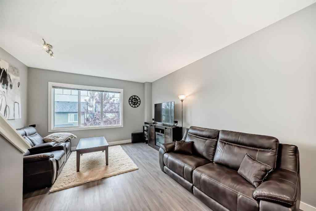 MLS® A2239508 - Unit #127 2802 Kings Heights Gate SE in Ravenswood Airdrie, Residential