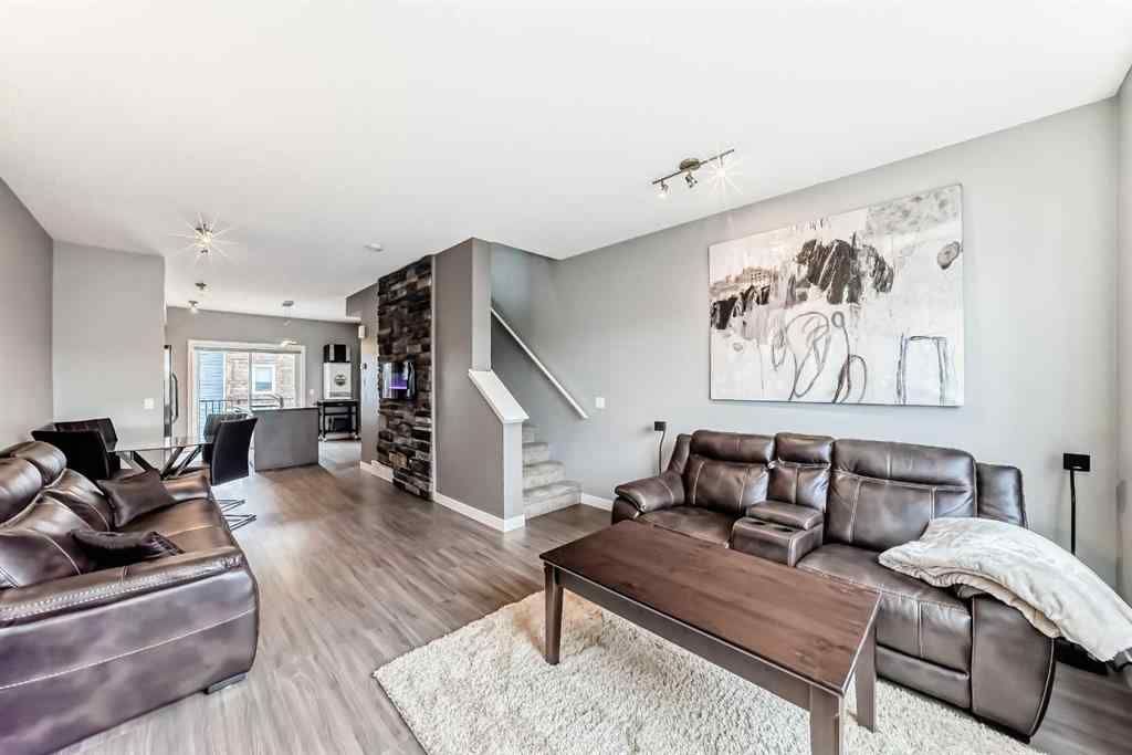 MLS® A2239508 - Unit #127 2802 Kings Heights Gate SE in Ravenswood Airdrie, Residential
