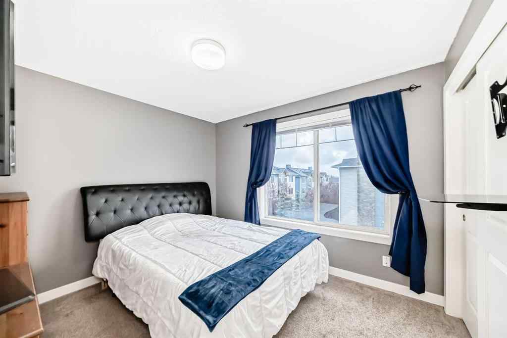 MLS® A2239508 - Unit #127 2802 Kings Heights Gate SE in Ravenswood Airdrie, Residential