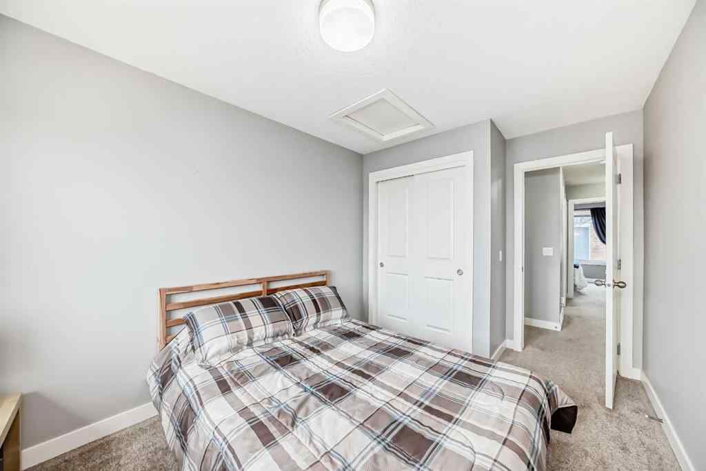 MLS® A2239508 - Unit #127 2802 Kings Heights Gate SE in Ravenswood Airdrie, Residential