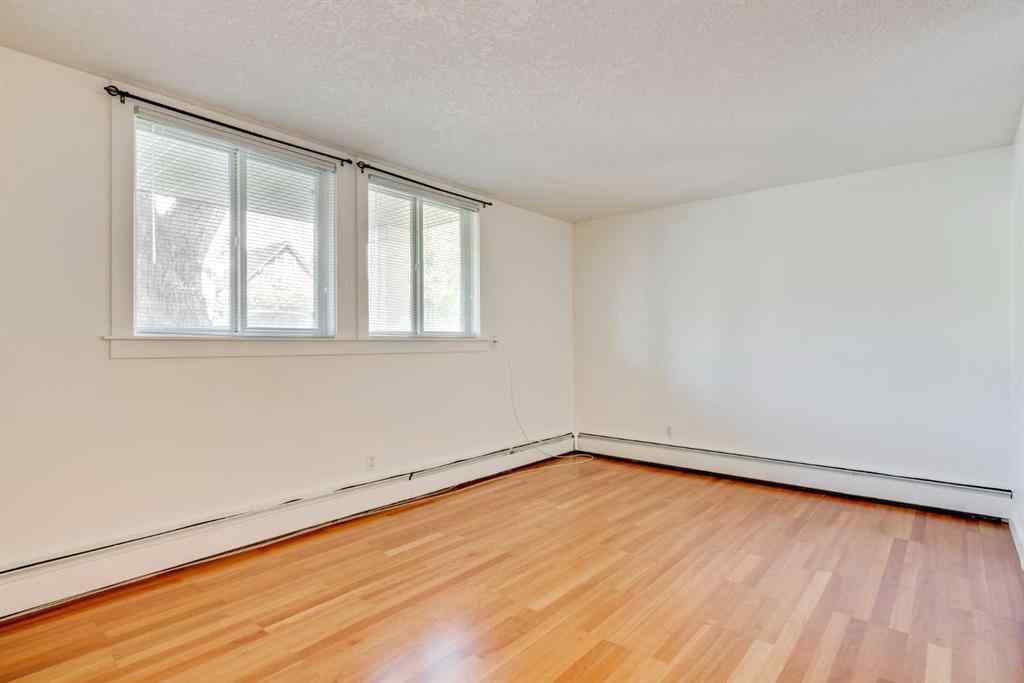 MLS® A2239535 - Unit #105 927 2 Avenue NW in Sunnyside Calgary, Residential
