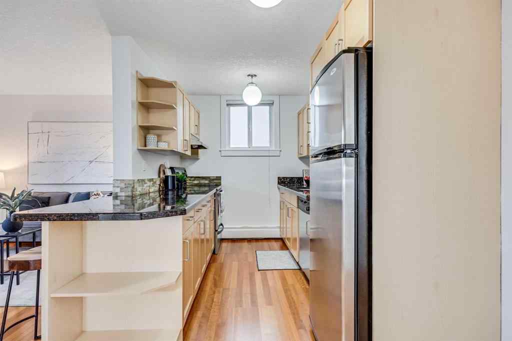 MLS® A2239535 - Unit #105 927 2 Avenue NW in Sunnyside Calgary, Residential