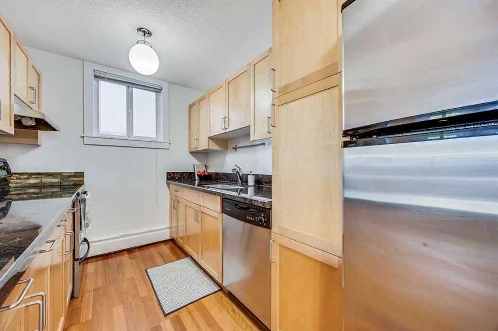 MLS® A2239535 - Unit #105 927 2 Avenue NW in Sunnyside Calgary, Residential