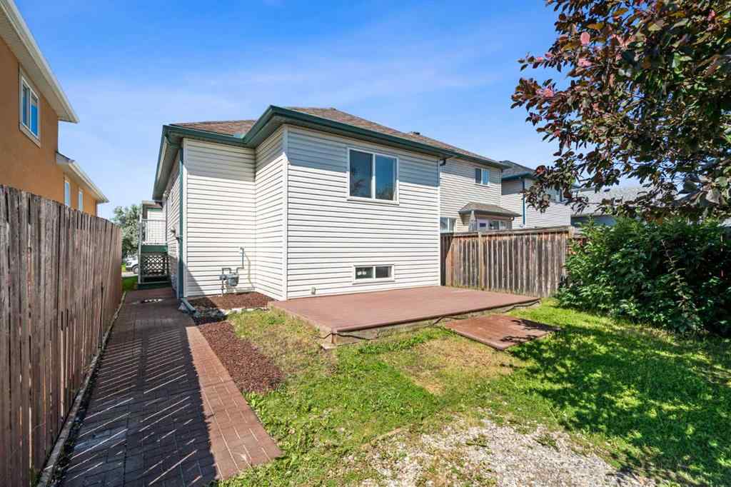 MLS® A2239540 - 104 Saddlemead Road NE in Saddle Ridge Calgary, Residential