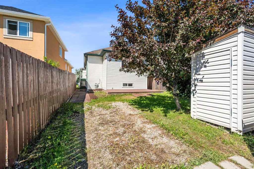 MLS® A2239540 - 104 Saddlemead Road NE in Saddle Ridge Calgary, Residential