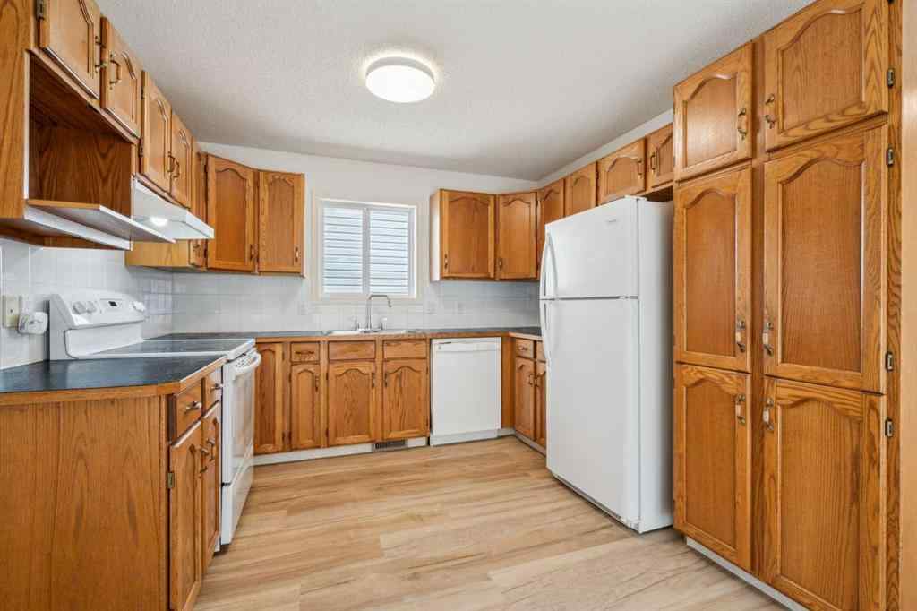MLS® A2239540 - 104 Saddlemead Road NE in Saddle Ridge Calgary, Residential