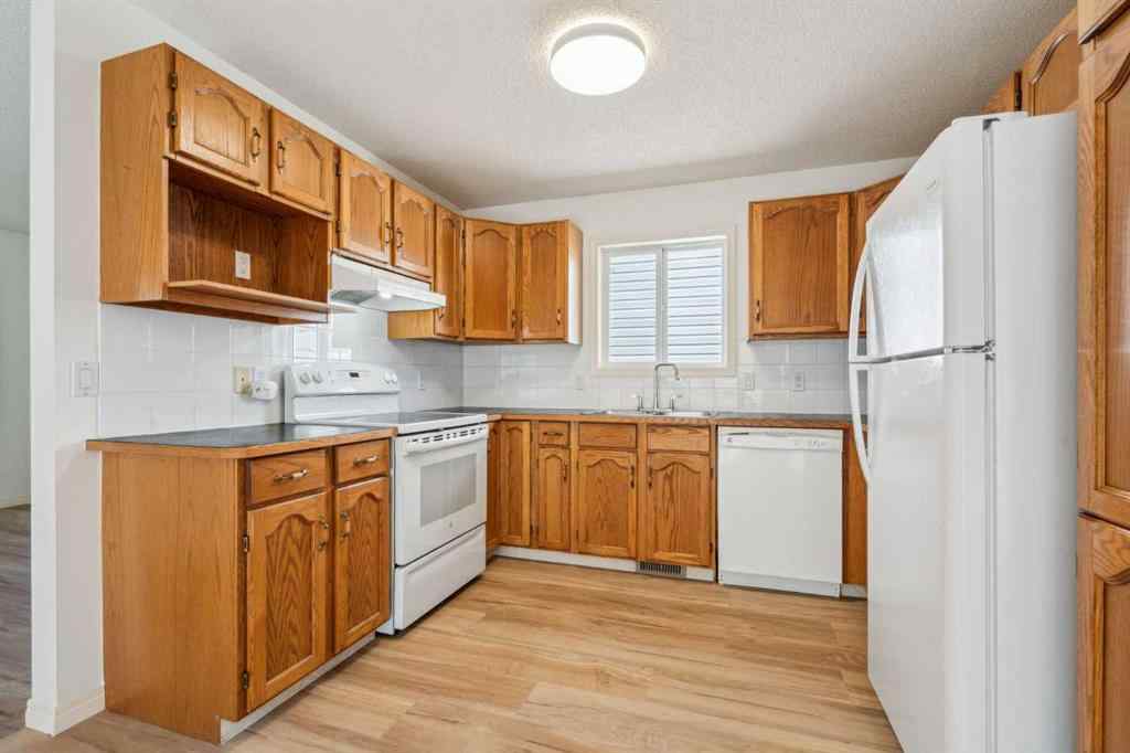 MLS® A2239540 - 104 Saddlemead Road NE in Saddle Ridge Calgary, Residential