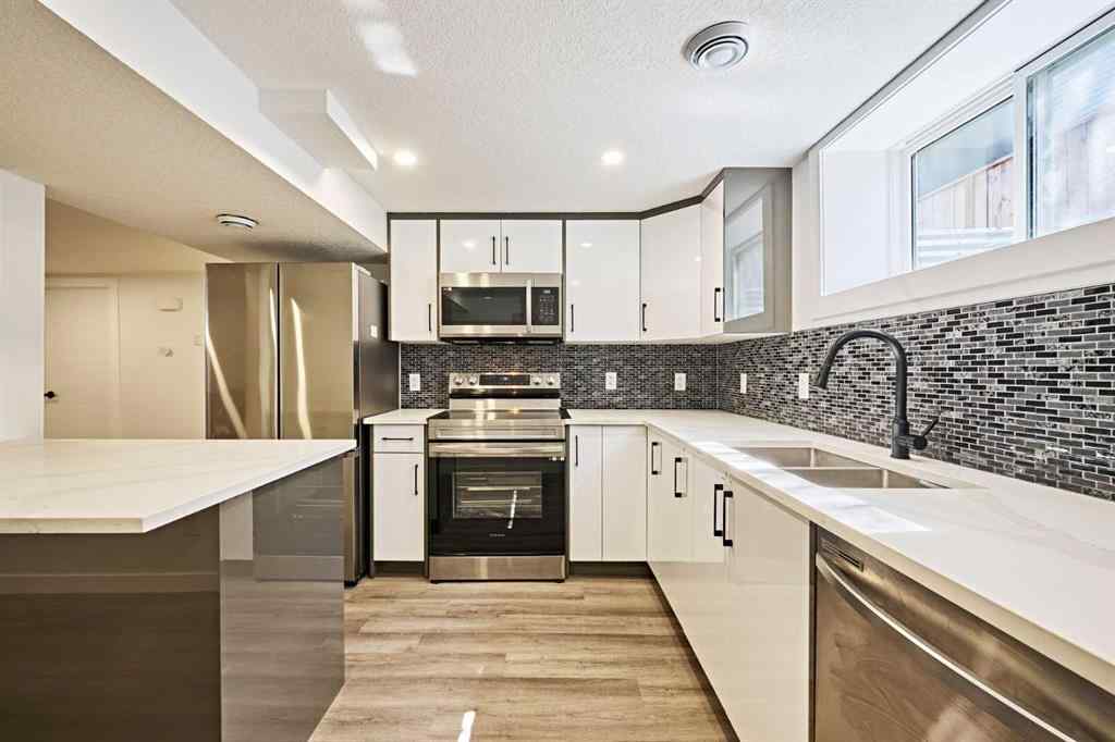 MLS® A2239567 - 77 Hartford Road NW in Highwood Calgary, Residential