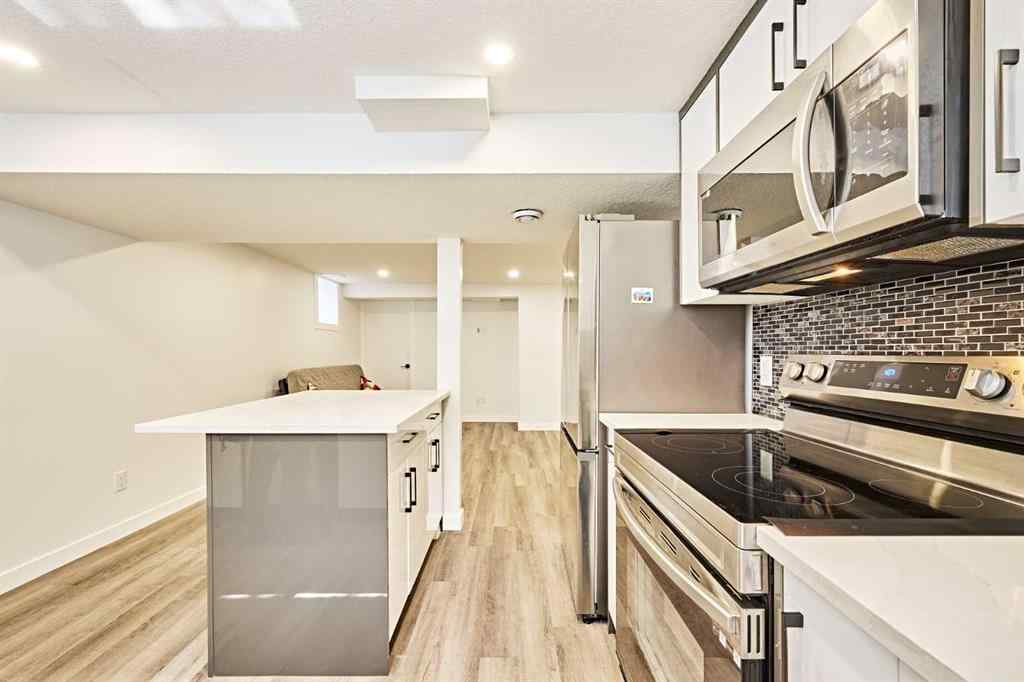 MLS® A2239567 - 77 Hartford Road NW in Highwood Calgary, Residential