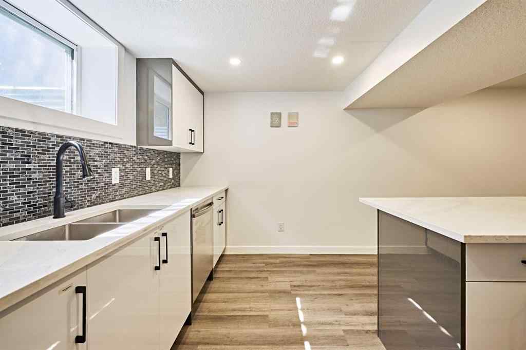 MLS® A2239567 - 77 Hartford Road NW in Highwood Calgary, Residential