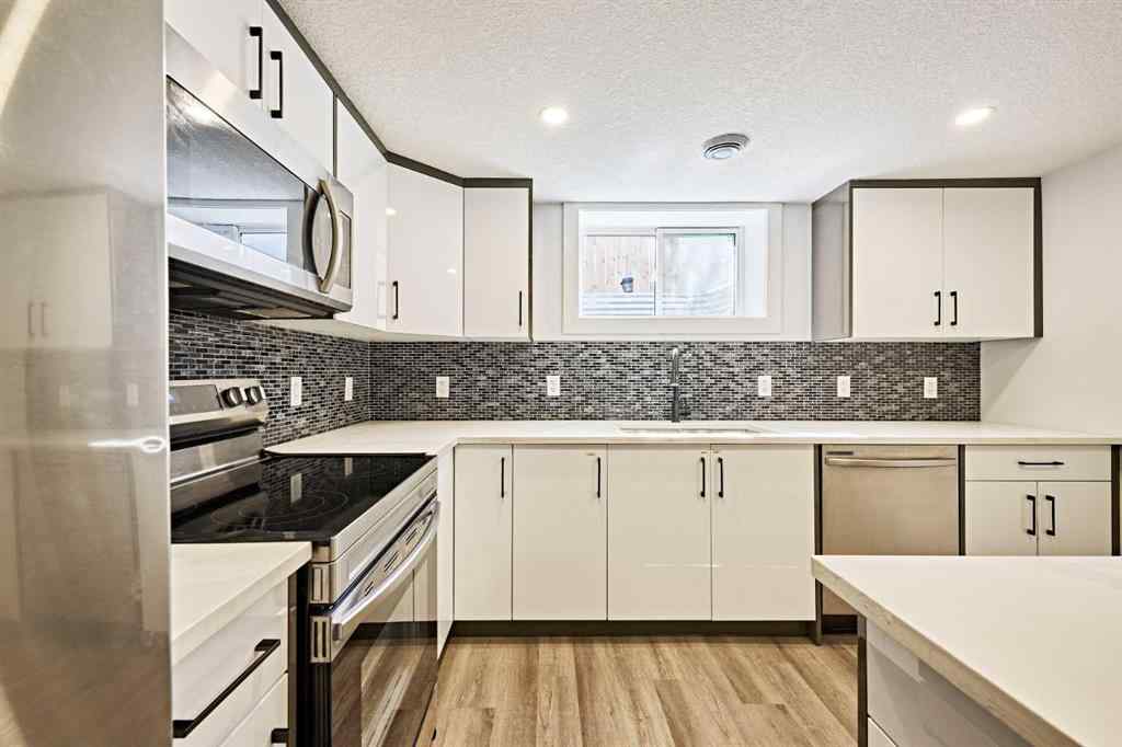 MLS® A2239567 - 77 Hartford Road NW in Highwood Calgary, Residential