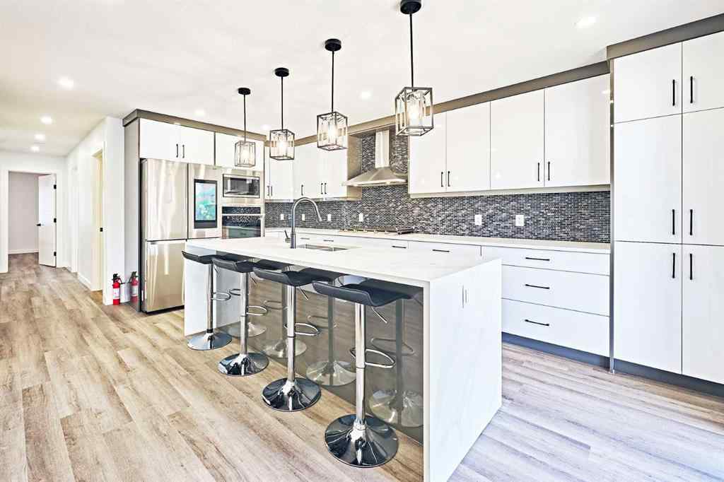 MLS® A2239567 - 77 Hartford Road NW in Highwood Calgary, Residential