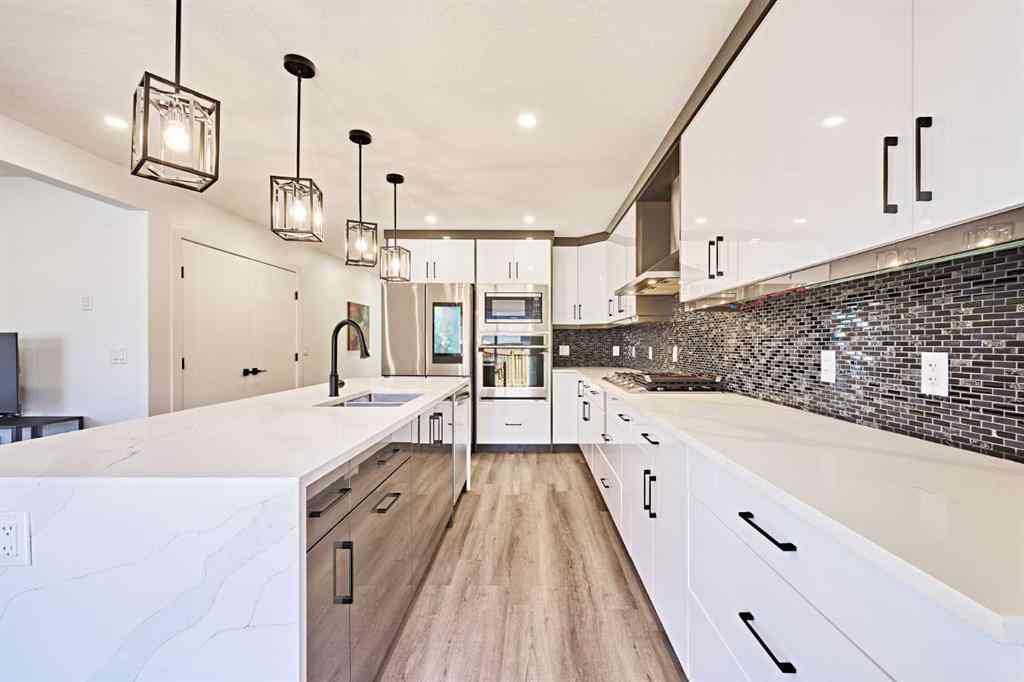 MLS® A2239567 - 77 Hartford Road NW in Highwood Calgary, Residential