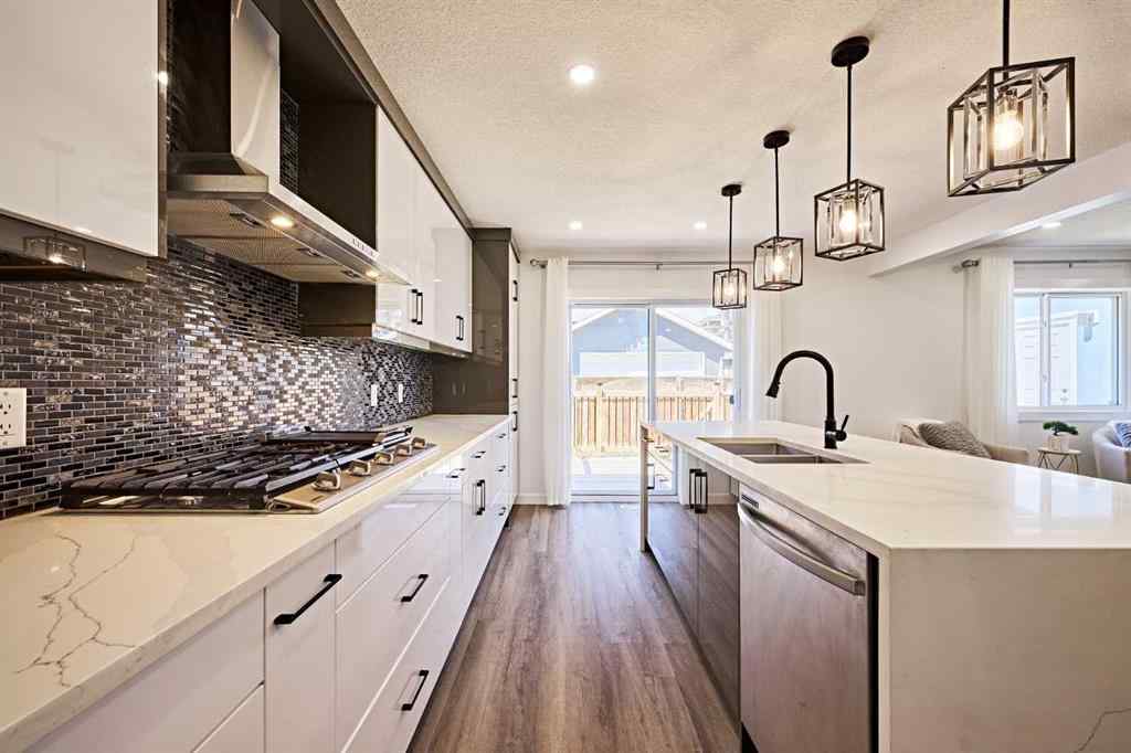 MLS® A2239567 - 77 Hartford Road NW in Highwood Calgary, Residential