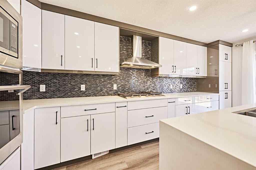 MLS® A2239567 - 77 Hartford Road NW in Highwood Calgary, Residential