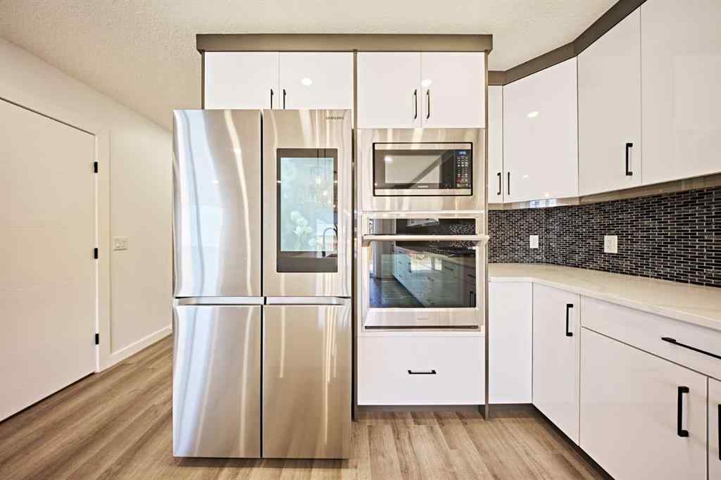 MLS® A2239567 - 77 Hartford Road NW in Highwood Calgary, Residential